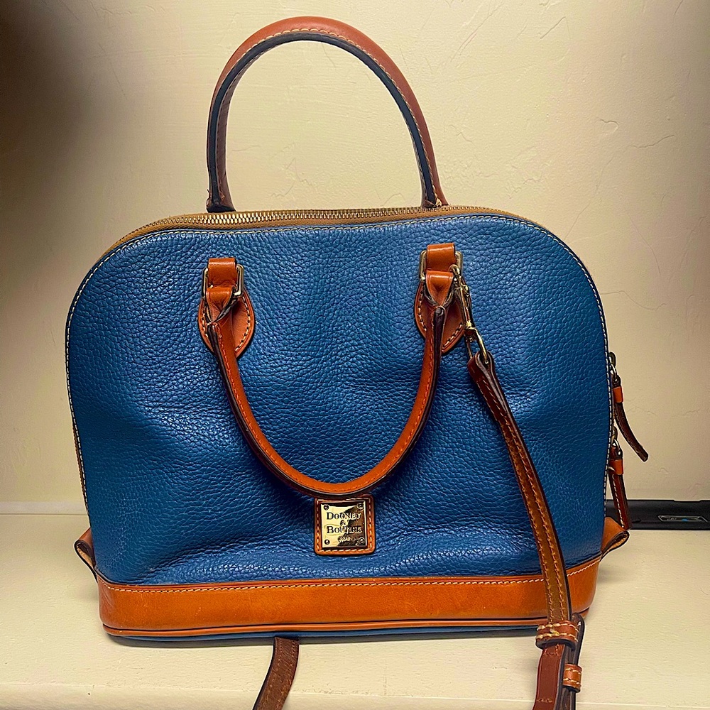 Blue purse with brown handles inside is red good condition no rips